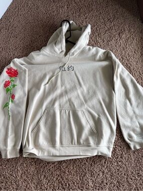 Cream Pullover Hoodie with Red Rose Sleeve Graphic